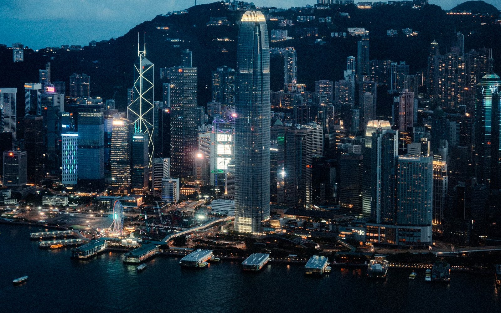 Hong Kong night skyline — city systems the AI City Brain is meant to join